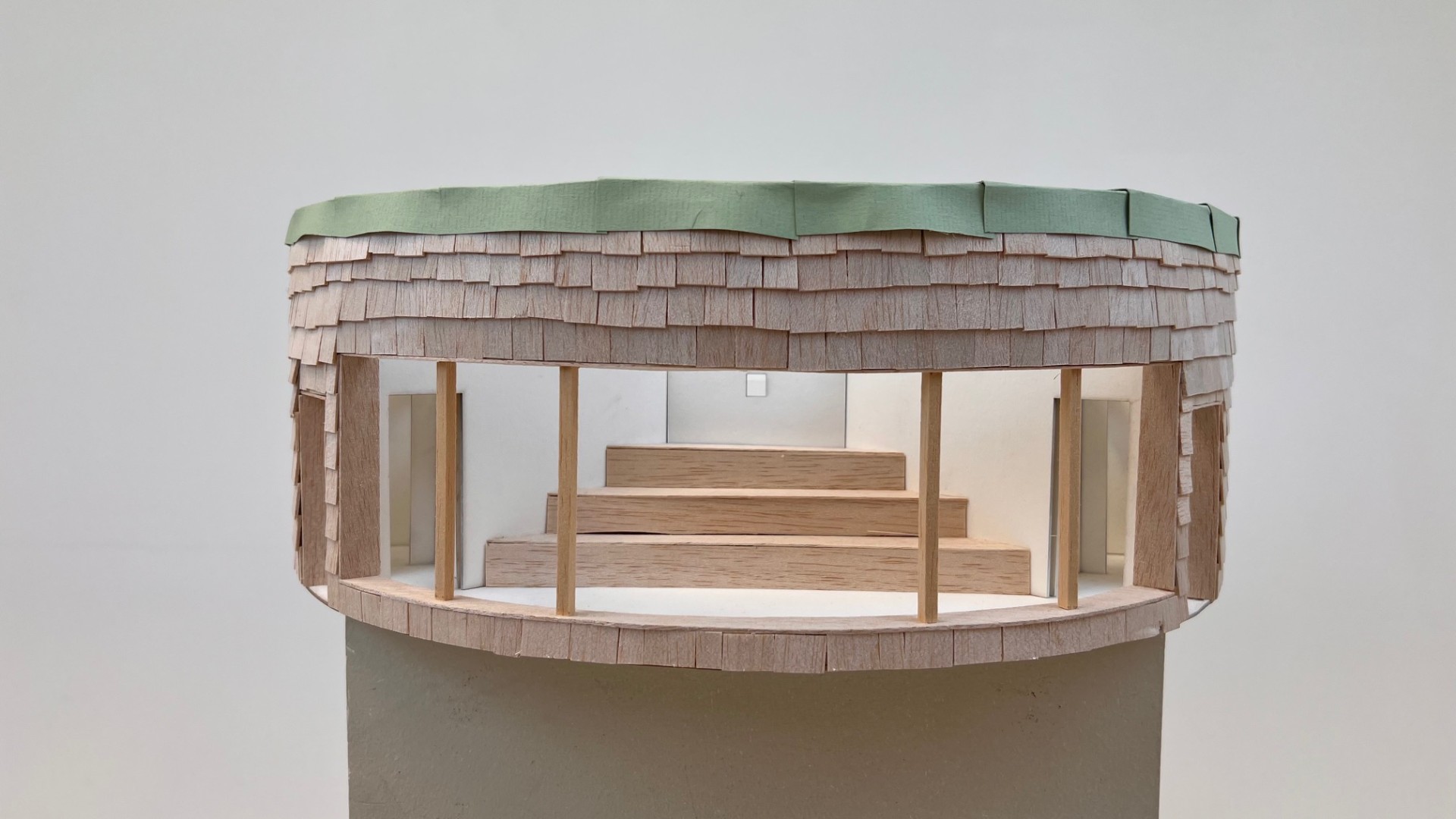 Physical model interior with shingle roof and bench tiers