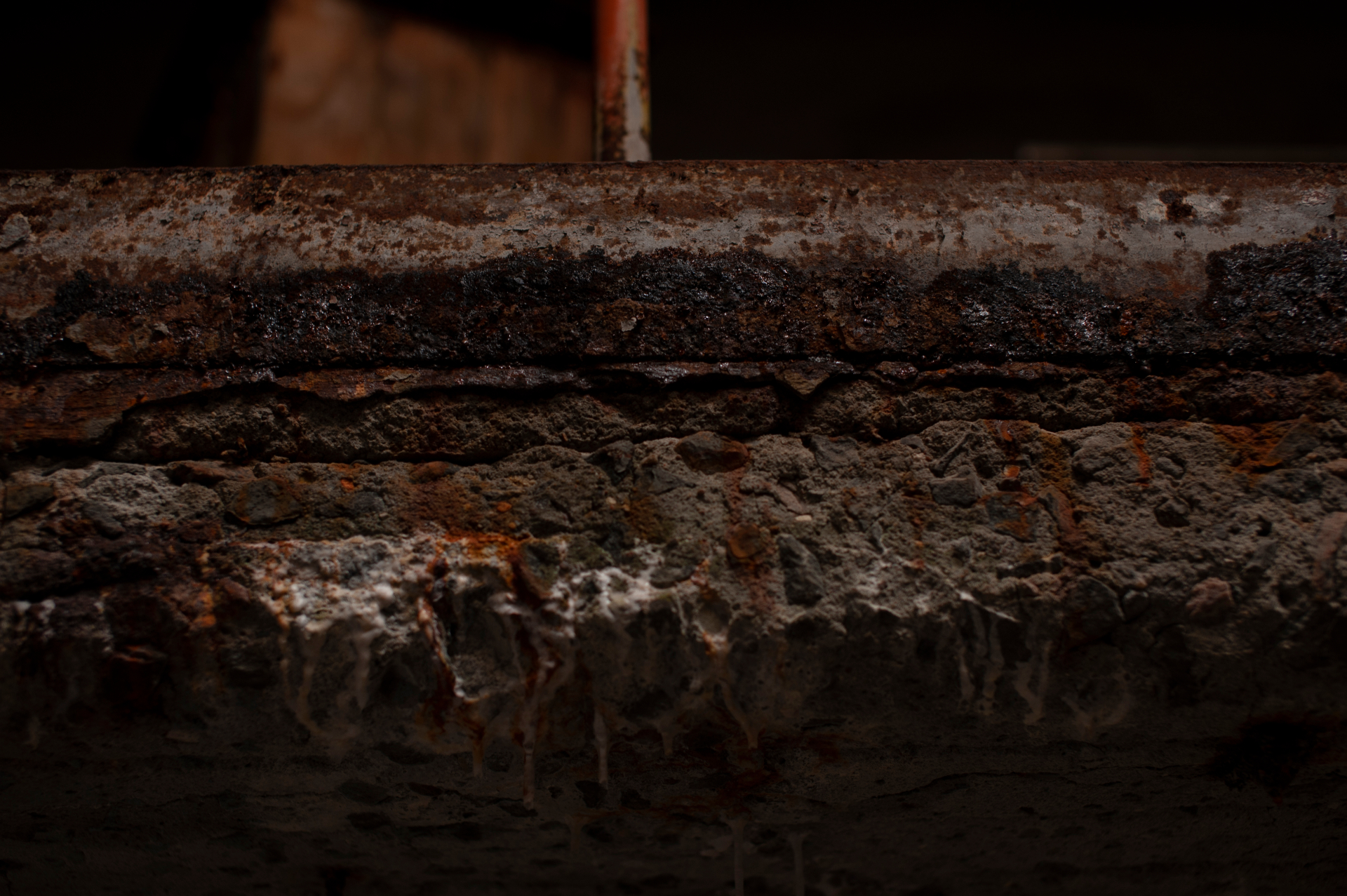 Rusted pipe and concrete detail