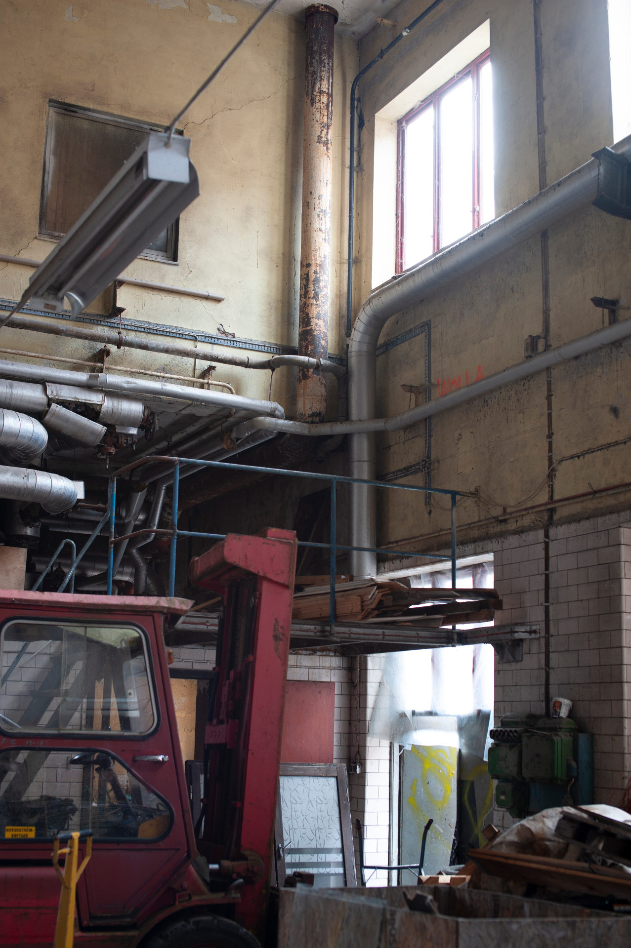 Steam plant pipes and chimney interior